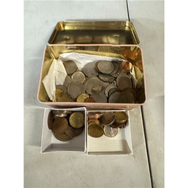 Tin of vintage foreign coins