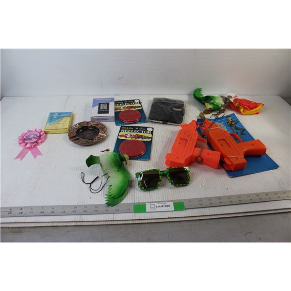 Minecraft Sunglasses, (2) Rubber birds, Blow up Beach Ball, (2) Toy Guns, (2) Car reflectors, Misc.