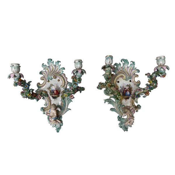 Matching Pair Of Meissen Wall Sconces With Figural Cupids And Flower Decoration