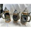 Image 2 : 3 Vintage Porcelain Embossed Beer Steins