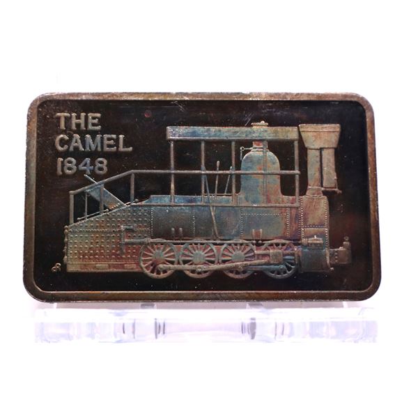 The Camel 1848 1oz proof silver art bar. Nice toning. Hard to see on photo. (tax exempt)