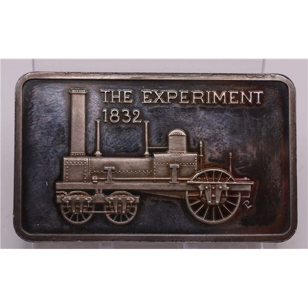 The Experiment 1832 1oz proof silver art bar. Nice toning. Hard to see on photo. (tax exempt)