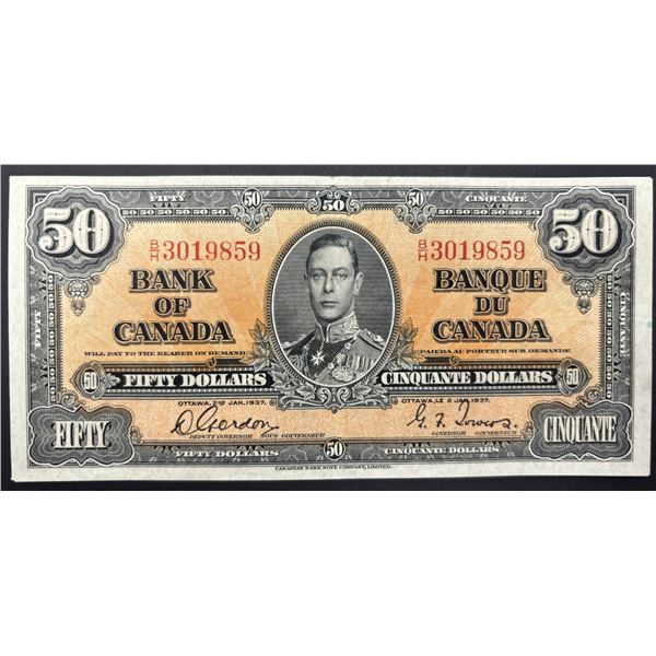 1937 $50. A very nice example. VF+. Gordon/Towers B/H3019859