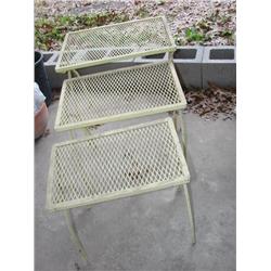 3 yellow metal patio tables