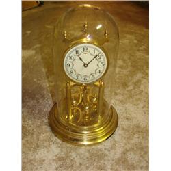 Glass dome mantle clock