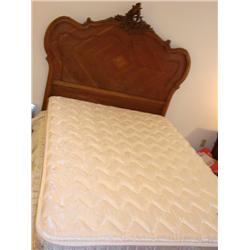 Full size bed w/carved headboard