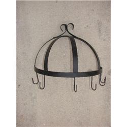 Black wrought iron pot rack