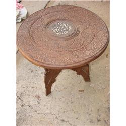 Small wood carved table