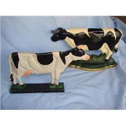2 cast iron cow doorstops