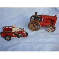 2 cast iron tractor toys