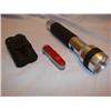 Image 1 : Flashlight, binoculars, swiss army knife