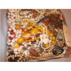 Large bag stuffed full of costume jewelry