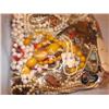 Image 1 : Large bag stuffed full of costume jewelry