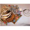 Image 1 : Large bag stuffed full of costume jewelry