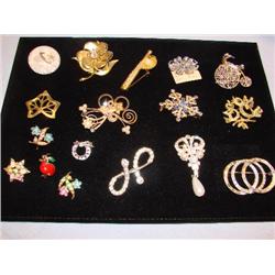17 brooches