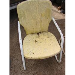Yellow metal patio chair