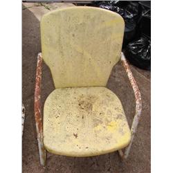 Yellow metal patio chair