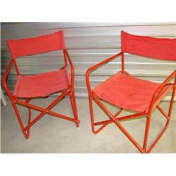 2 red folding chairs