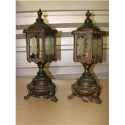 Pair of brass lamps (note: one pane miss)