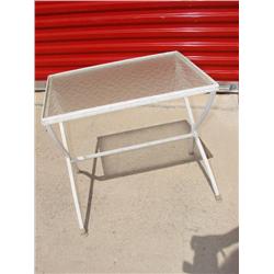 Small glass top metal patio table
