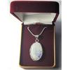 Image 1 : 19)  OVAL NATURAL MOONSTONE PENDANT ON 16" SNAKE