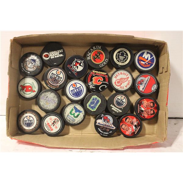 - TRAY OF NHL HOCKEY PUCKS