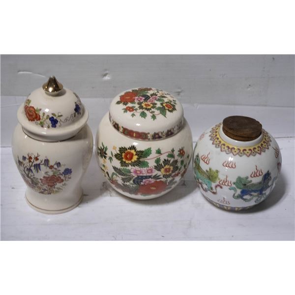 3 DECORATIVE JARS WITH TOPS