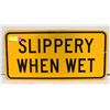 SLIPPERY WHEN WET ROAD SIGN