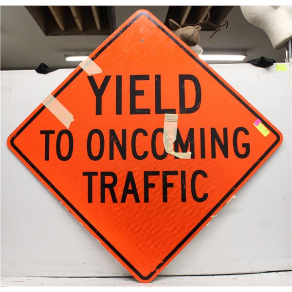 YIELD TO ONCOMING TRAFFIC SIGN