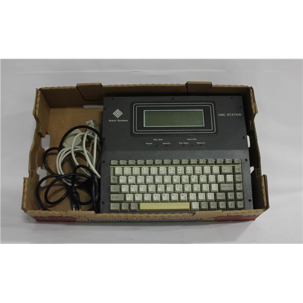 BOX WITH A GRECO SYSTEMS CNC STATION