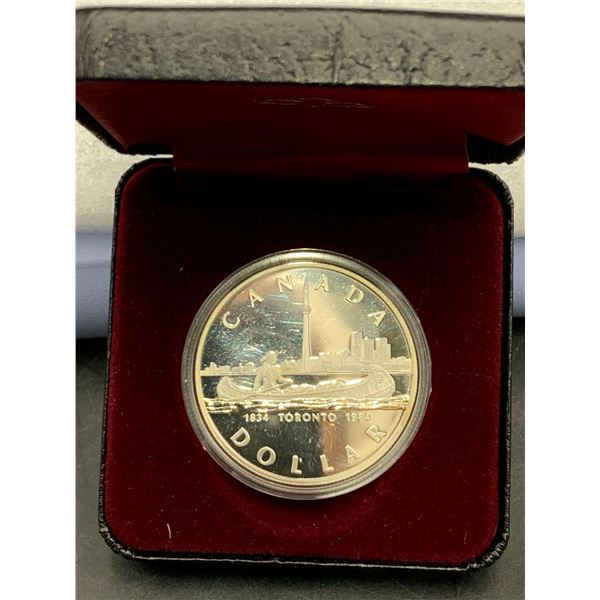 Royal Canadian Mint issued Toronto 1834-1984 Cased Commemorative $1.00 silver dollar (500 silver 23.