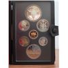 Image 2 : 1982 Canadian Proof Set. The Nicely Toned Silver Dollar commemorates the 100th Anniversary of Regina