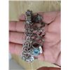 Image 2 : Charm bracelet- most of the charms are marked sterling with wooden box