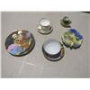 Image 1 : tea cups with plates