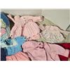 Image 4 : 4 Bags of assorted dolls clothes
