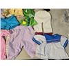 Image 4 : 4 Bags of assorted dolls clothes