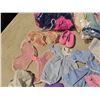 Image 7 : 4 Bags of assorted dolls clothes