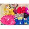 Image 2 : 4 Bags of assorted dolls clothes
