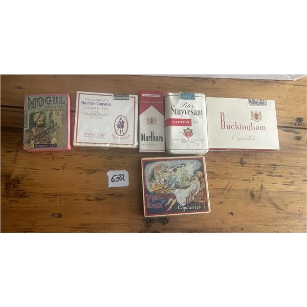 4 Full tobacco packs, 1 box and empty tin