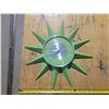 Image 1 : green plastic starburst clock