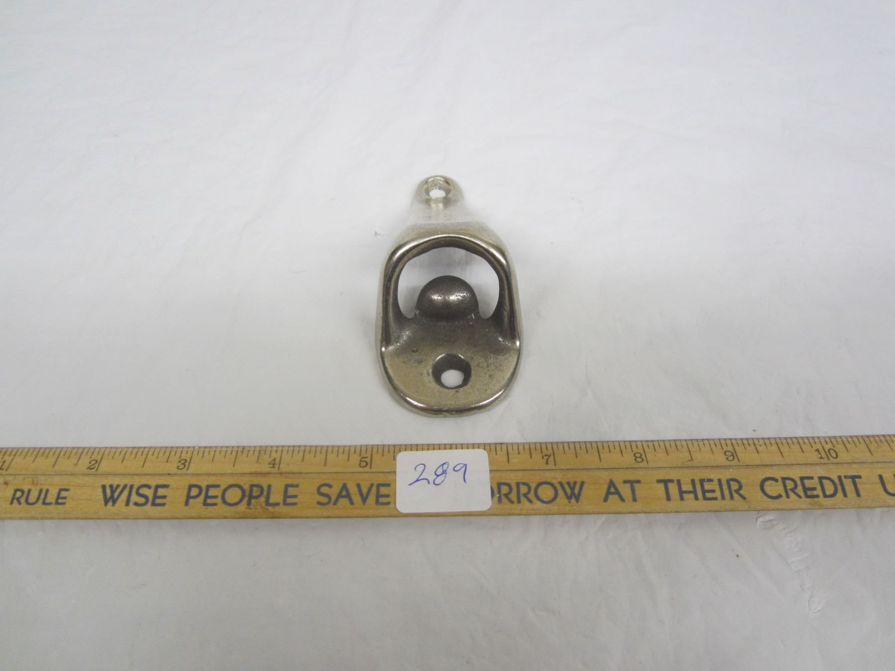 Antique New Old Stock Wall Mount Bottle Opener - Schmalz Auctions