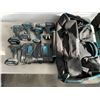 Image 1 : FOUR MAKITA 18V CORDLESS IMPACTS AND DRILL WITH THREE BATTERIES AND DUAL CHARGER IN CARRY BAG, TESTE