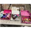 Image 2 : 3 BARBIE SUITCASES FULL OF CLOTHES AND ACCESSORIES
