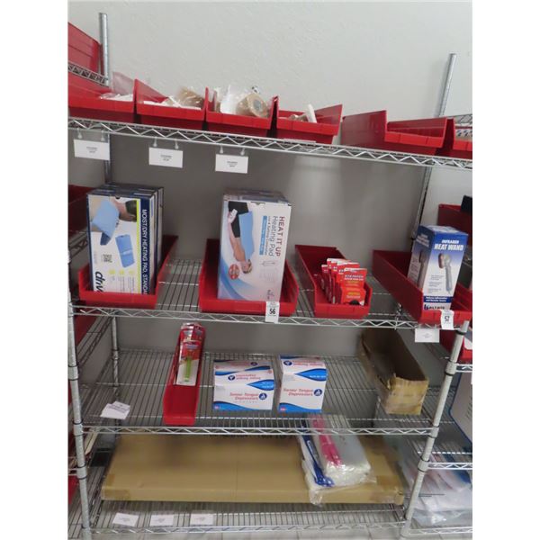 Heating Pads, Gauze, Supplies, Tongue Depressors on Rack