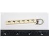 Image 1 : #1220 VINTAGE CARVED RULER KEYCHAIN