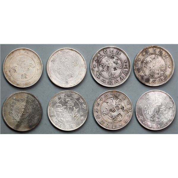 China; lot of 8 Dollars.  Various dates and varieties.  Review carefully.  Fine to EF.  A nice lot.