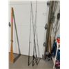 Image 1 : Fishing rods, one real