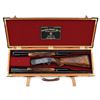 Image 2 : Stunning Cased Angelo Bee Engraved & Gold Inlaid Winchester Model 42 Shotgun Two Barrel Set