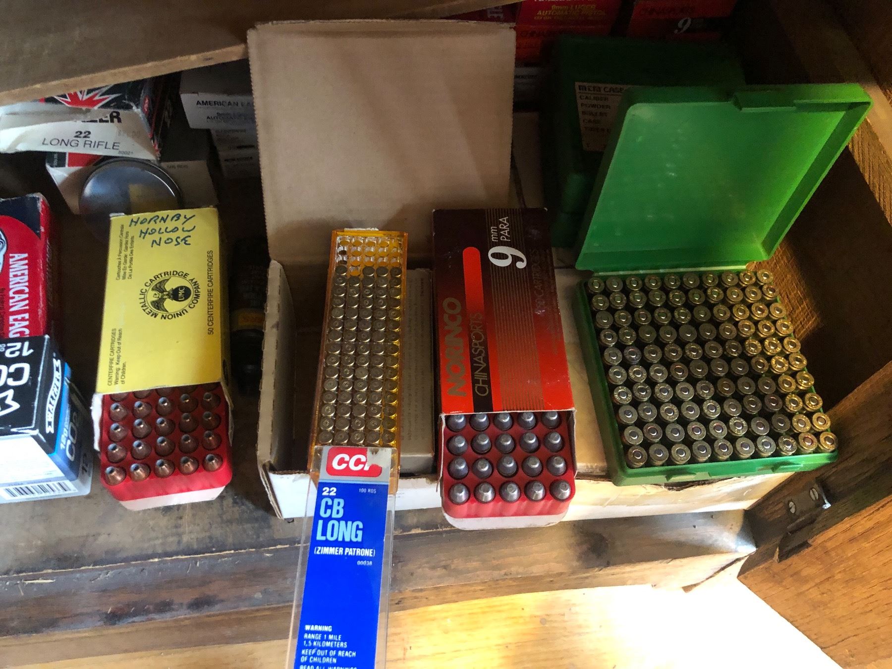 Group of assorted 9mm & rifle ammo/ CO2 cylinders/ ammo jackets/ pellets