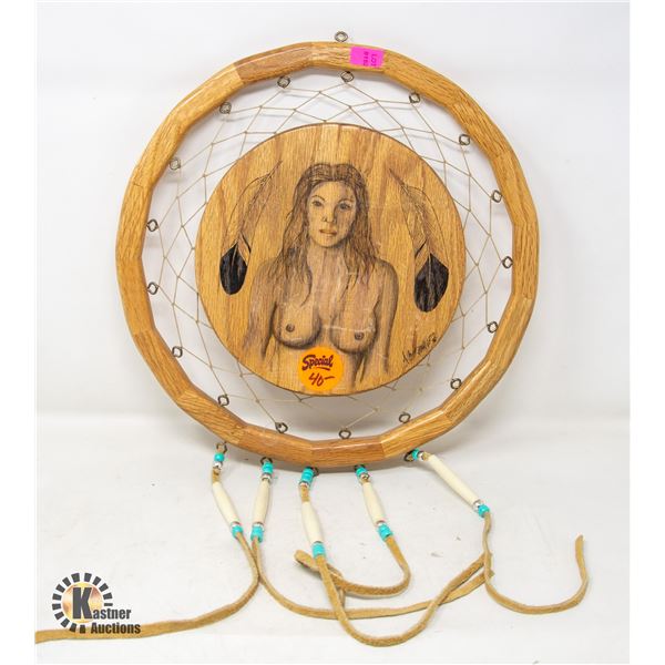 WOODEN DREAMCATCHER; TOPLESS WOMAN